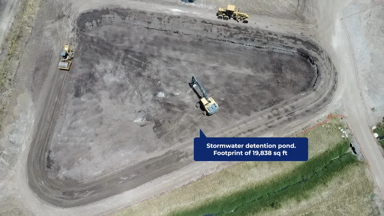 Stormwater detention pond. Footprint of 19,838 sq ft